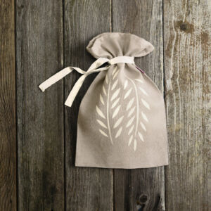 sour-colored, sand-colored small bread bag made of rustic linen with lining